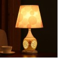 Chinese ceramic bedroom bedside table lamp creative hollow warm and romantic wedding wedding room modern and simple