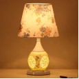 Chinese ceramic bedroom bedside table lamp creative hollow warm and romantic wedding wedding room modern and simple