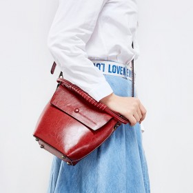 Summer new niche design female bag cowhide bucket bag leather vertical casual shoulder bag