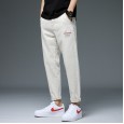 Spring and autumn new four seasons slim jeans fashion Korean version of the wild elastic feet pants blue trend men