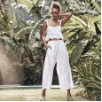 Spring and summer women's sexy solid color sleeveless suspenders exposed navel trousers pants suit