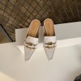 Early spring catwalk models with metal buckle square head and half slippers