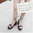 Summer new Roman sponge cake thick bottom thick heel waterproof platform high heel cross strap nightclub hollow sandal female