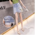 Super hot skirt women's spring and summer new irregular a-line skirt high waist was thin embroidered denim skirt